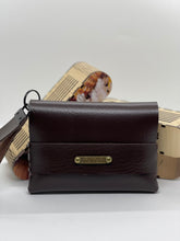 Load image into Gallery viewer, Brown leather pouch with gold clasp on a white background