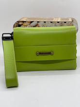 Load image into Gallery viewer, Green handbag with a strap on a white background