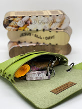 Load image into Gallery viewer, Green keychain pouch with keys and a small bag, with another bag labeled 'Jesus All Day' in the background.