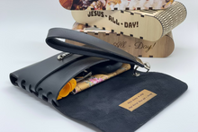 Load image into Gallery viewer, Black leather pouch with text on a white background