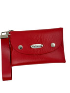 Red leather clutch bag with 'Believe' tag on a white background