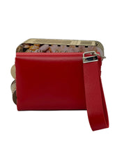 Load image into Gallery viewer, Red handbag with a strap on a light gray background
